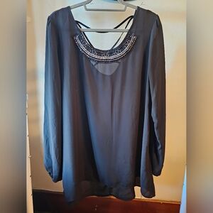 Sheer black long sleeve blouse with neckline accent